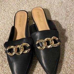 Black and gold mules